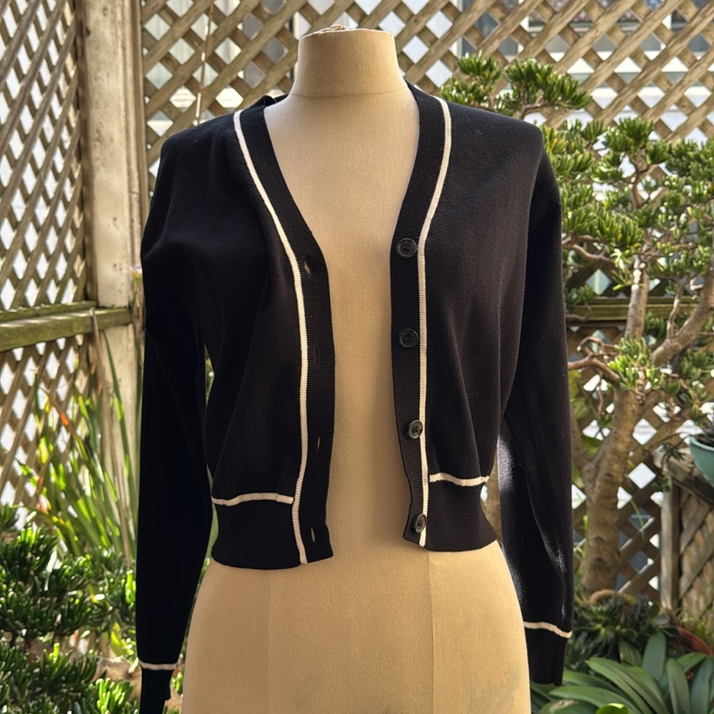 MNG CARDIGAN BLACK w/White trim. 4 Button Closure  Size XS-roomy. NWOT